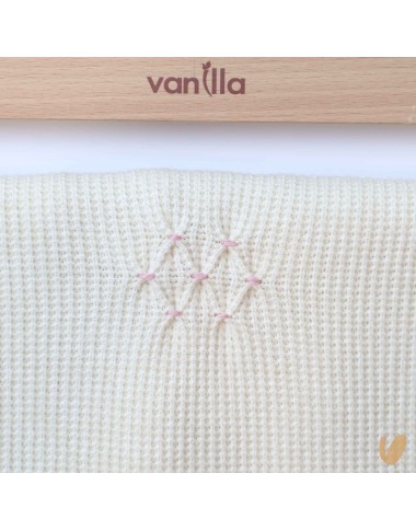 Knitted blanket with hand embroidery