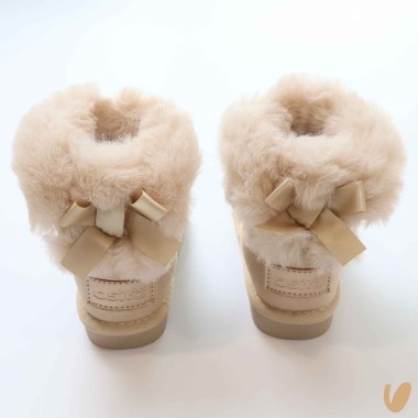 Stivaletti imbottiti fiocco Scarpe