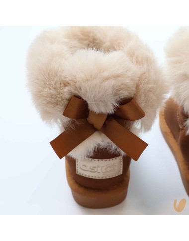 Upholstered bow boots