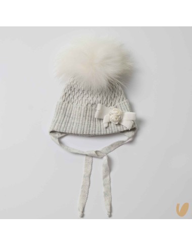 Hat with flowers and pom poms